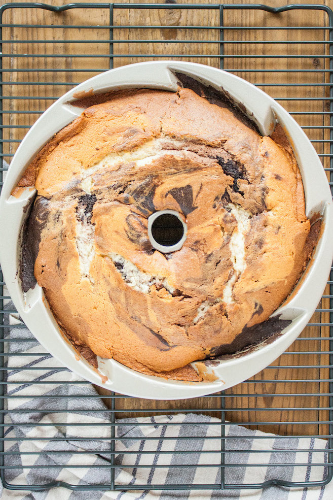 Overhead shot of the baked cake in a pan.