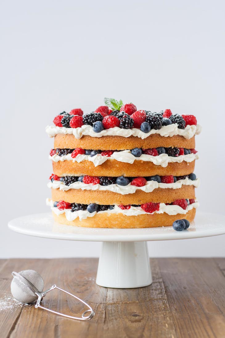 Cake on a white cake stand.