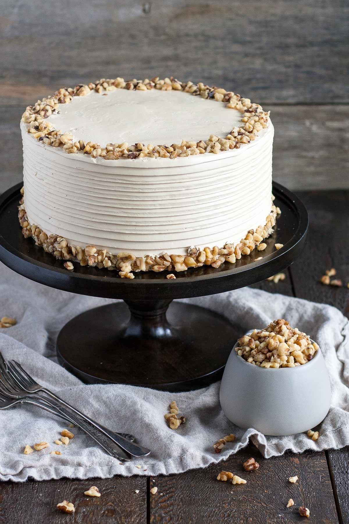 Angled shot of the cake on a cake stand.