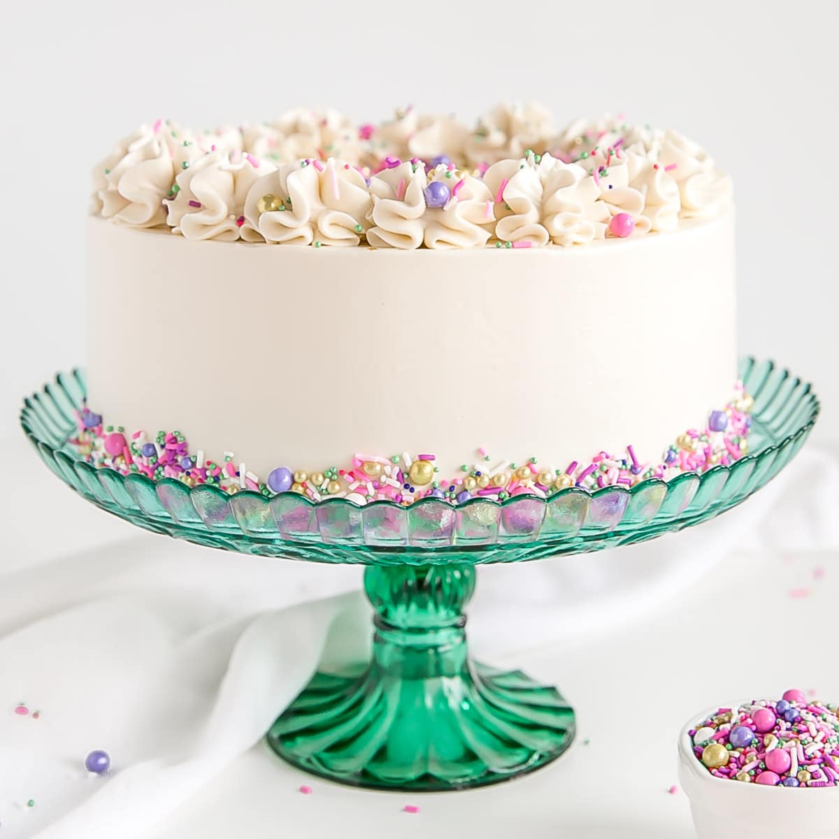 A decorated cake on a cake stand